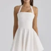 Cosette White Broderie Anglais + Cotton Halter Neck Mini Dress Cosette White Broderie Anglais + Cotton Halter Neck Mini Dress