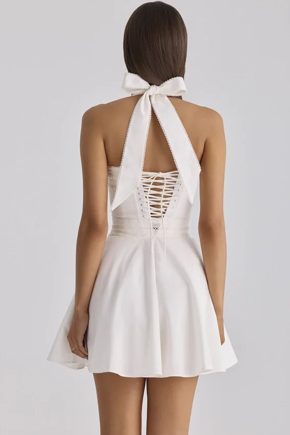Cosette White Broderie Anglais + Cotton Halter Neck Mini Dress Cosette White Broderie Anglais + Cotton Halter Neck Mini Dress