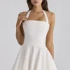 Cosette White Broderie Anglais + Cotton Halter Neck Mini Dress Cosette White Broderie Anglais + Cotton Halter Neck Mini Dress