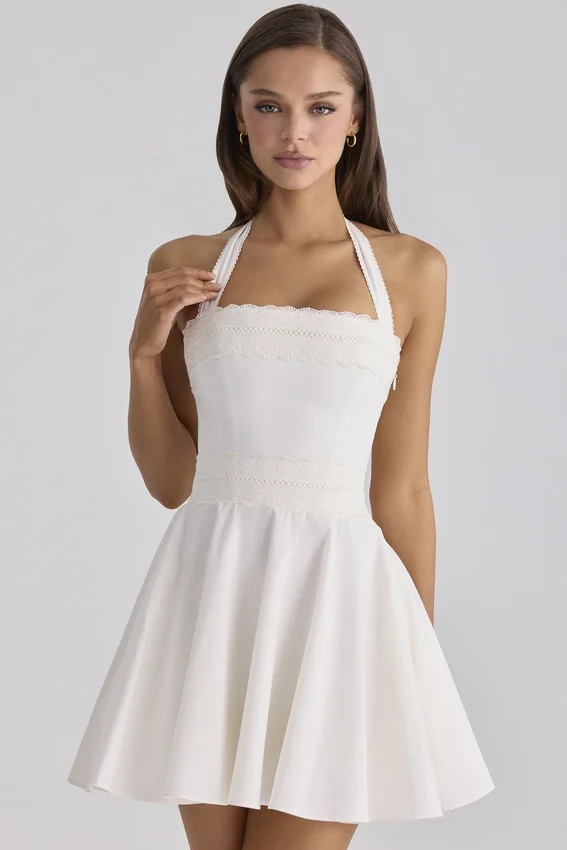 Cosette White Broderie Anglais + Cotton Halter Neck Mini Dress Cosette White Broderie Anglais + Cotton Halter Neck Mini Dress