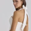 Cosette White Broderie Anglais + Cotton Halter Neck Mini Dress Cosette White Broderie Anglais + Cotton Halter Neck Mini Dress