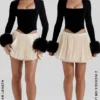 Emira Ivory Pleated Mini Skirt