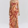 Lumira Sunset Swirl Print Ruffle Cut Out Maxi Dress Lumira Sunset Swirl Print Ruffle Cut Out Maxi Dress