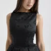 Melika Black Backless Embroidered Mini Puffball Dress
Melika Black Backless Embroidered Mini Puffball Dress