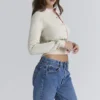 Mistle-Bow Cream Jacqard Wool Cardigan Mistle-Bow Cream Jacqard Wool Cardigan