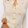 Poppie Cream Wool + Cashmere Pink Floral Embroidered Cardigan Poppie Cream Wool + Cashmere Pink Floral Embroidered Cardigan