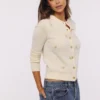 Poppie Cream Wool + Cashmere Pink Floral Embroidered Cardigan Poppie Cream Wool + Cashmere Pink Floral Embroidered Cardigan