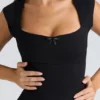 The Cap Sleeve Black Corset Top The Cap Sleeve Black Corset Top