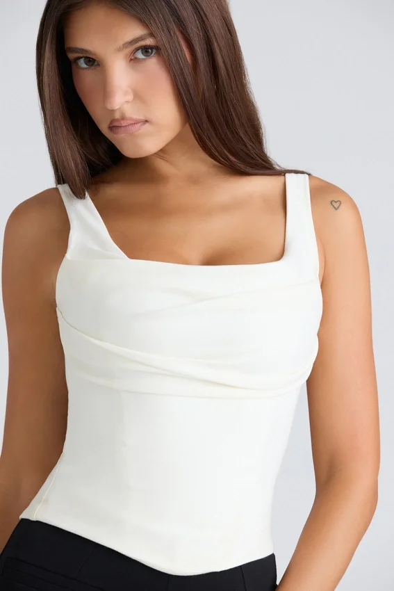 The Drape Neck Ivory Corset Top The Drape Neck Ivory Corset Top