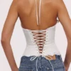 Zizi White Halter Neck Broderie Anglaise Corset Top Zizi White Halter Neck Broderie Anglaise Corset Top